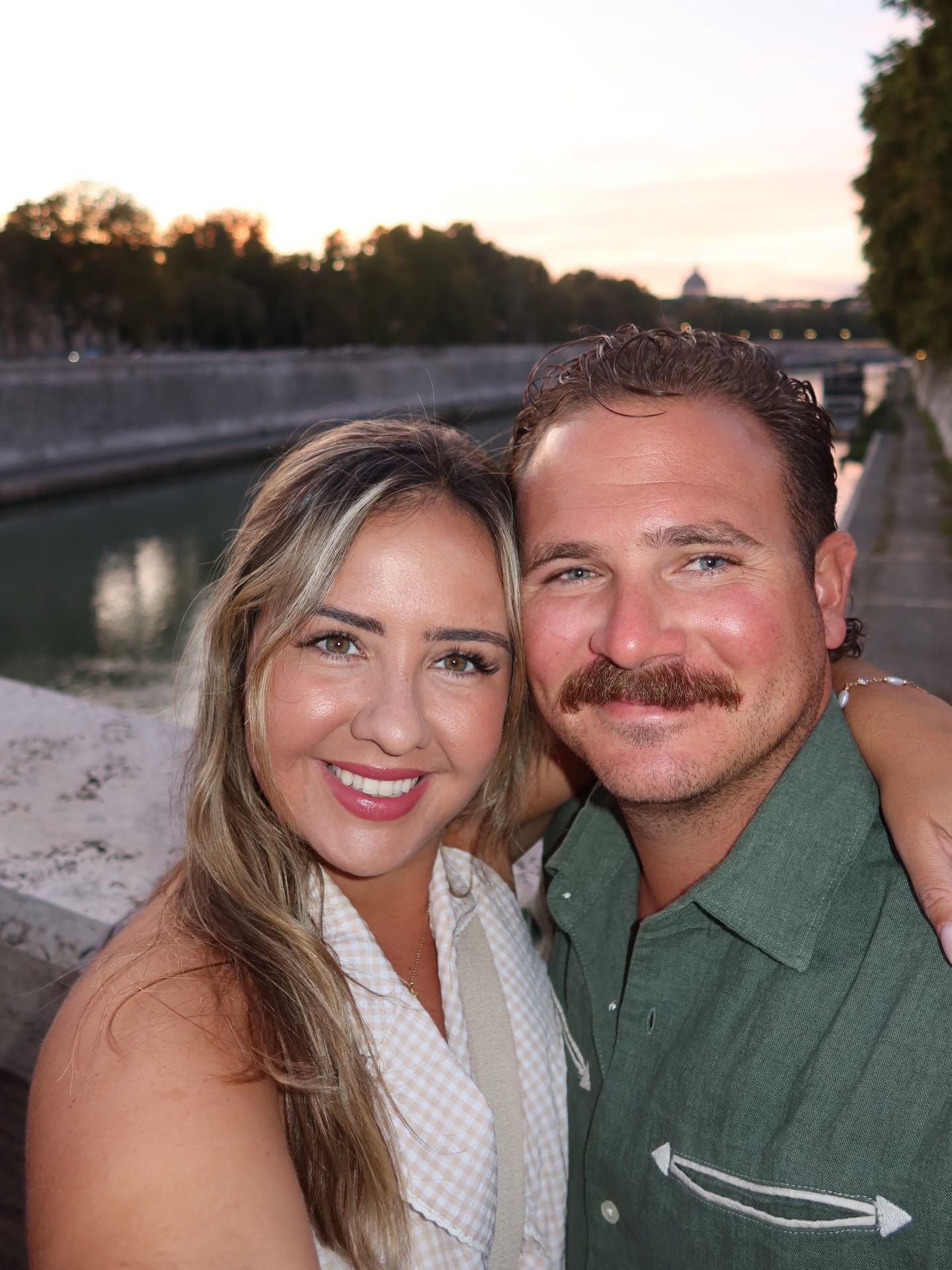 Jamie and Travis at sunset along the river